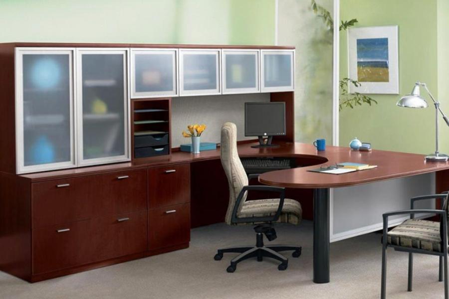 Reception desk in laminate with opaque glass doors in aluminium frame